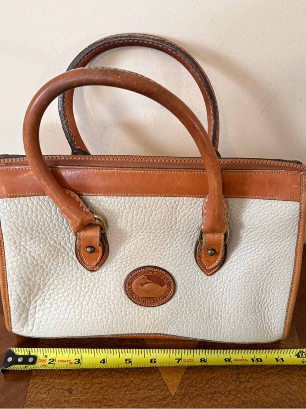 Dooney & Bourke White and Tan Pebbled Leather Satchel
